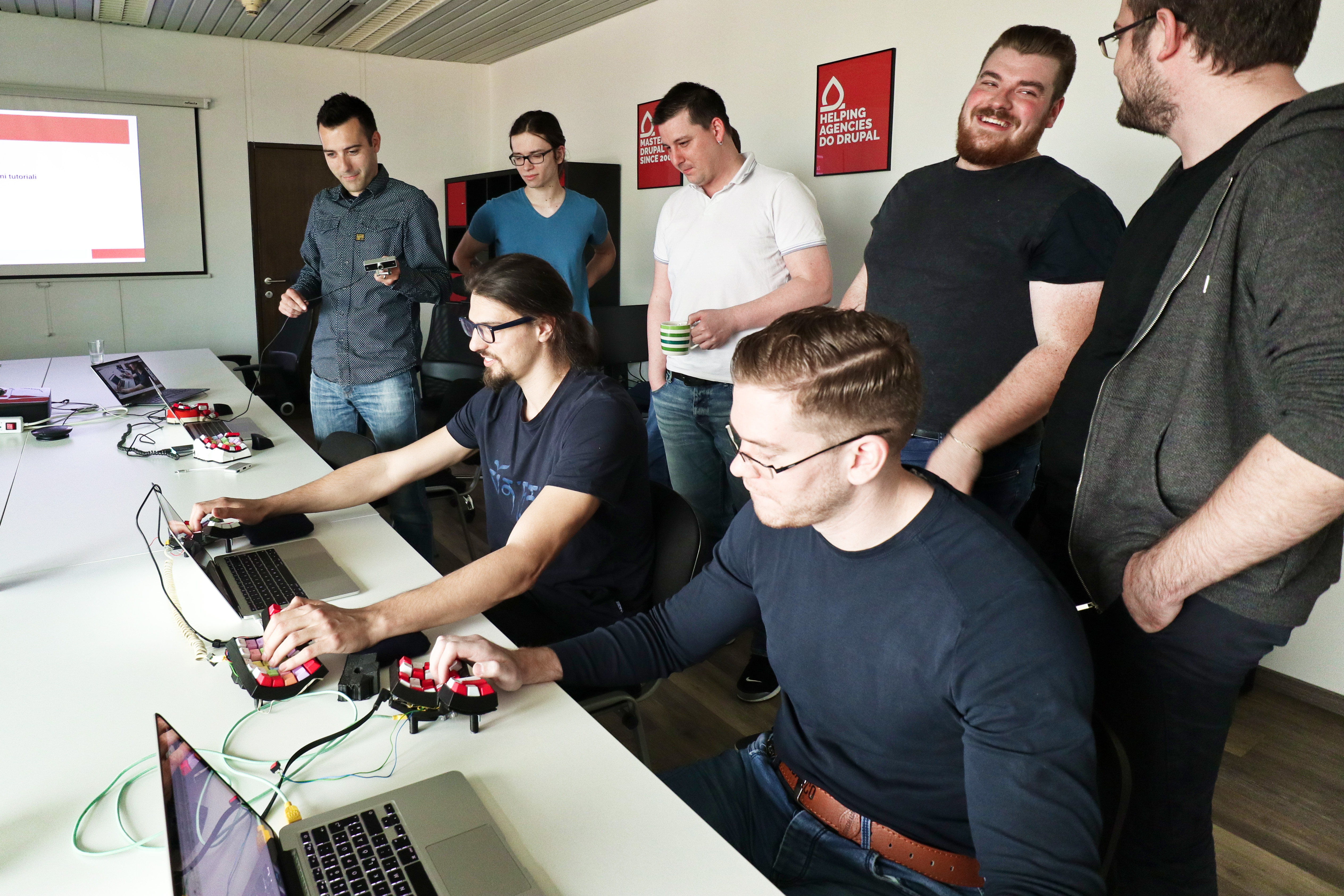 Agiledrop team using ergonomic keyboards