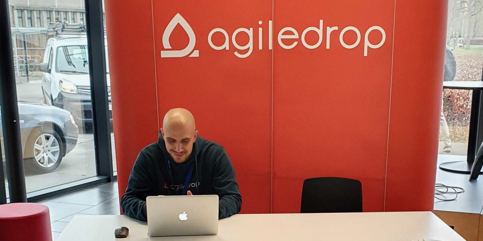Jure at Agiledrop's booth at Drupal DevDays 2022