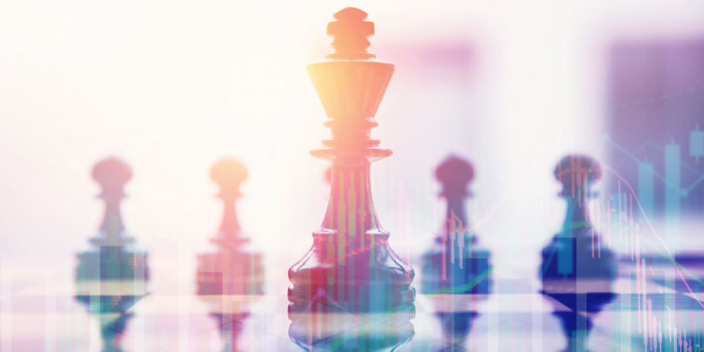 Chess figures with king in front against transparent digital background