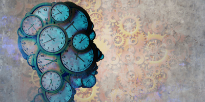 Illustration of head made out of clocks with gears in background