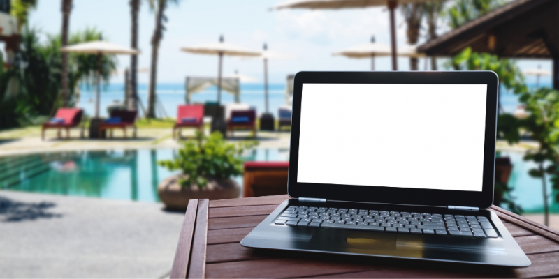 Laptop on a desk at the beach